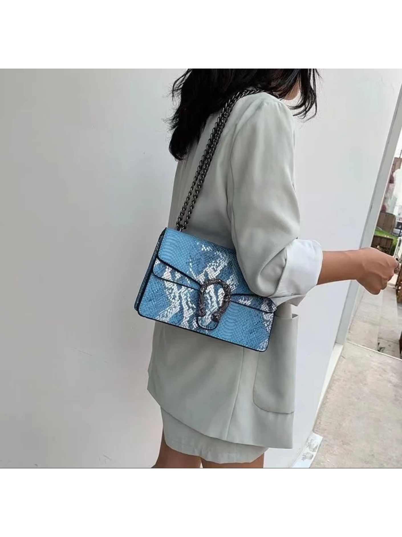 Bolso serpiente hebilla