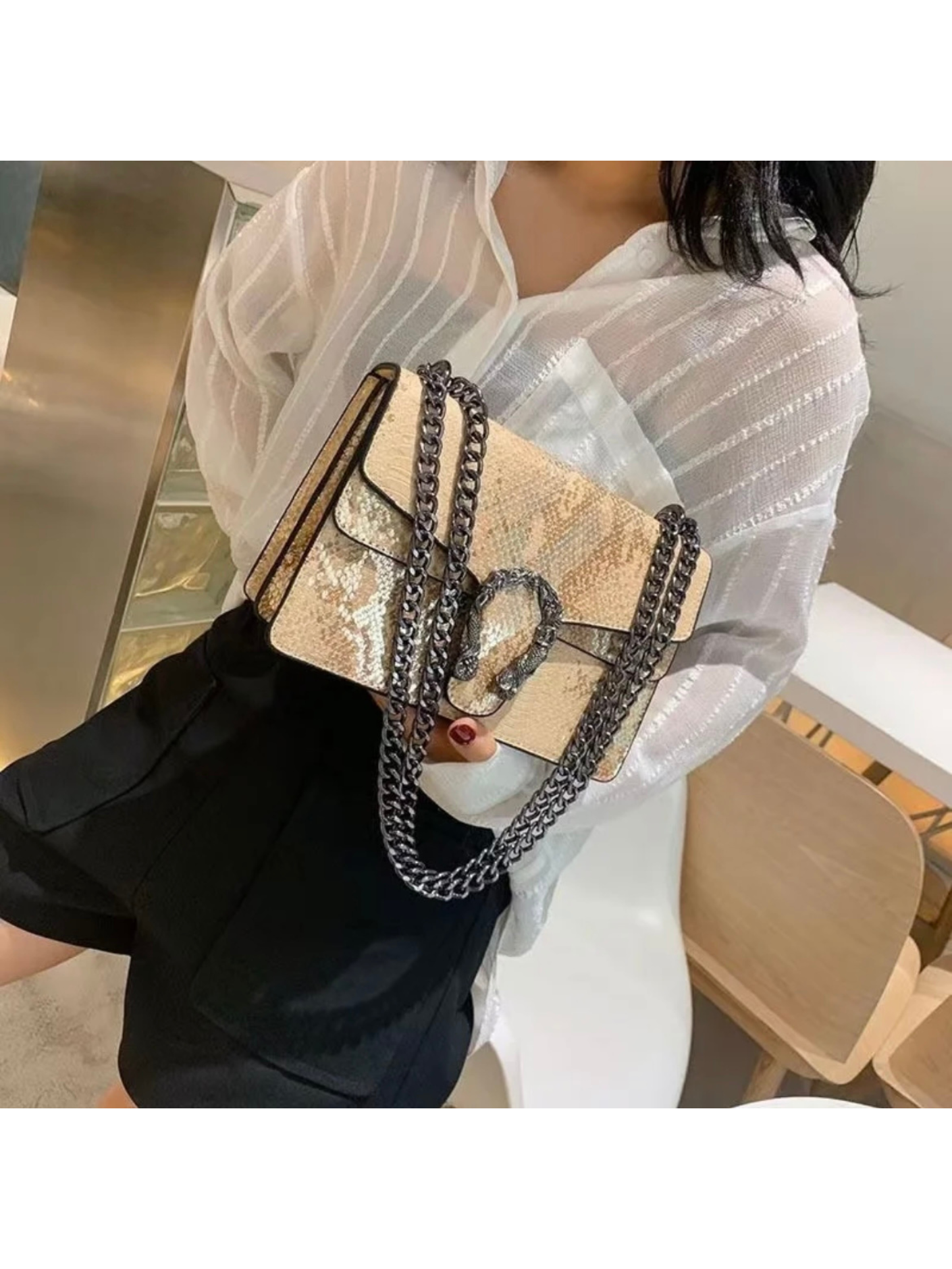 Bolso serpiente hebilla