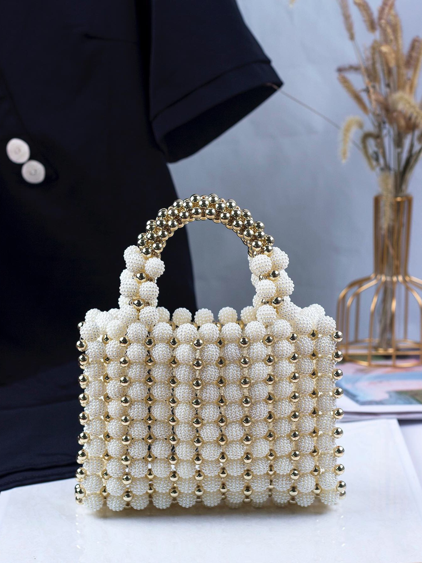 Bolso tejido perlas dorado