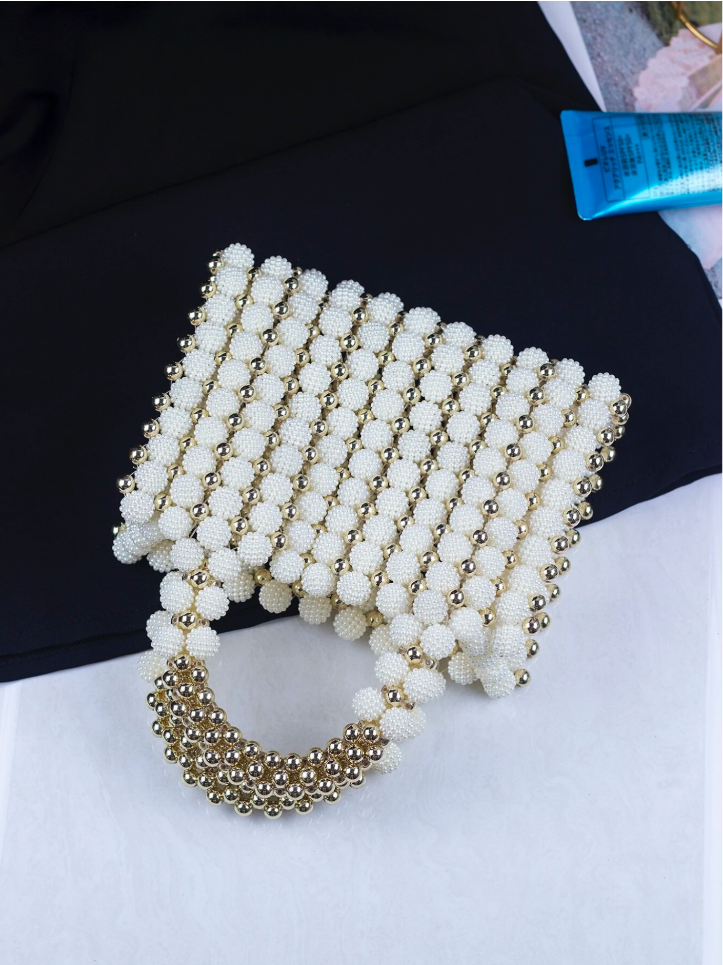 Bolso tejido perlas dorado
