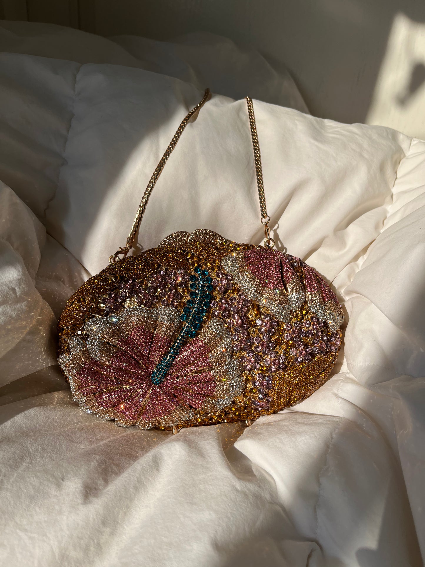 Bolso clutch diamantes flor