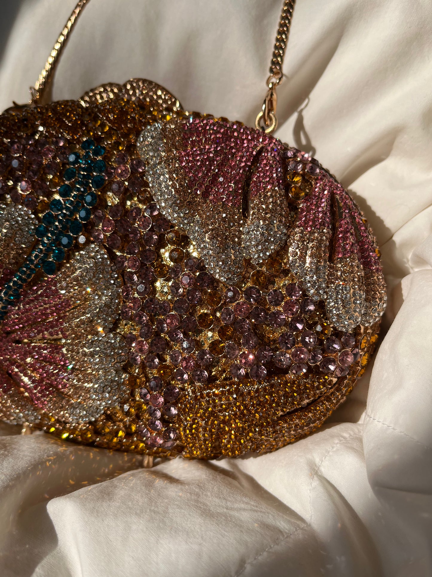Bolso clutch diamantes flor