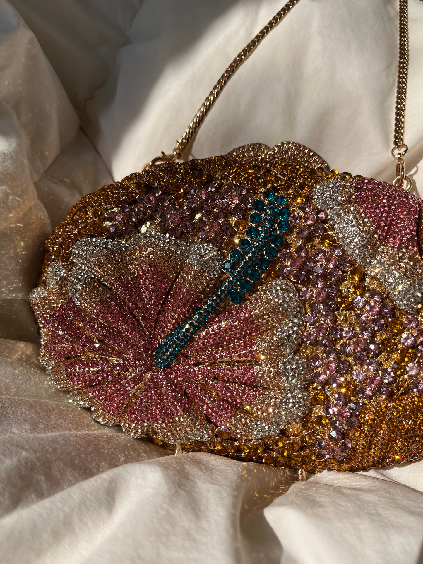 Bolso clutch diamantes flor