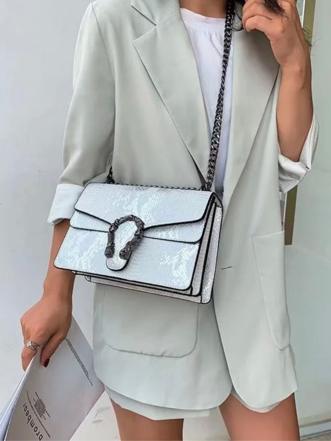 Bolso serpiente hebilla