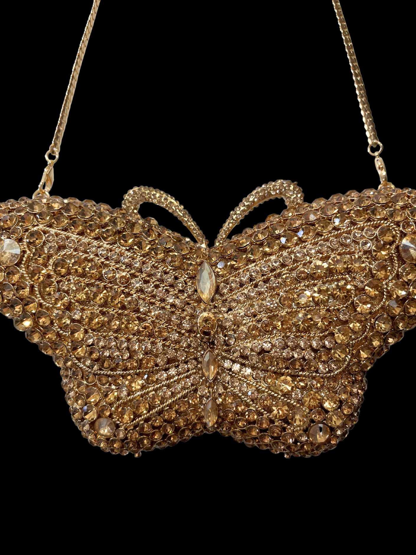 Bolso clutch diamantes mariposa