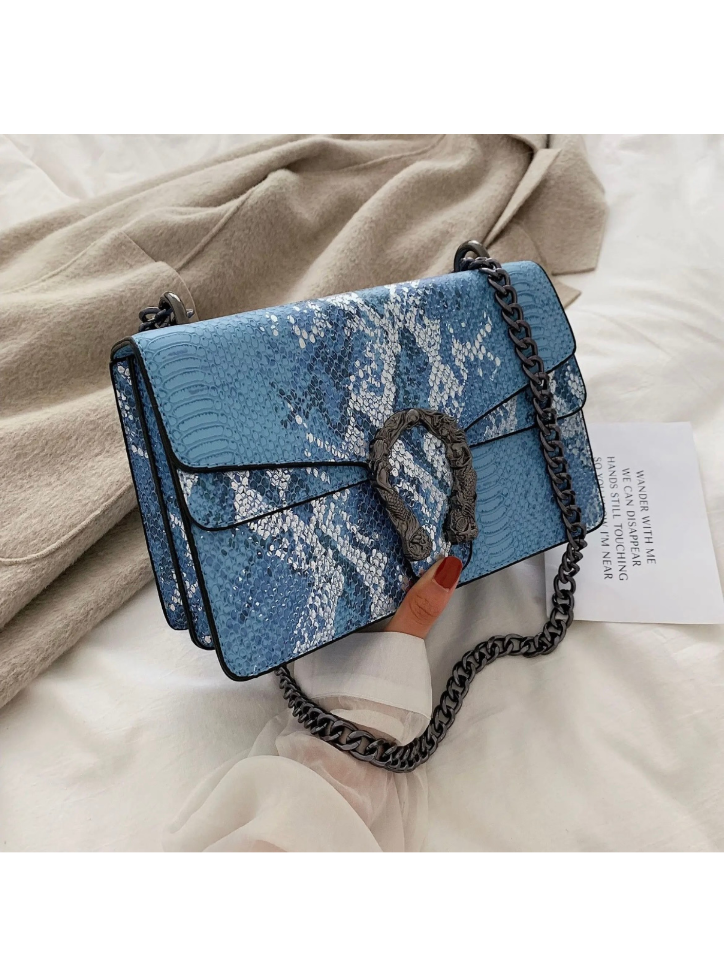 Bolso serpiente hebilla