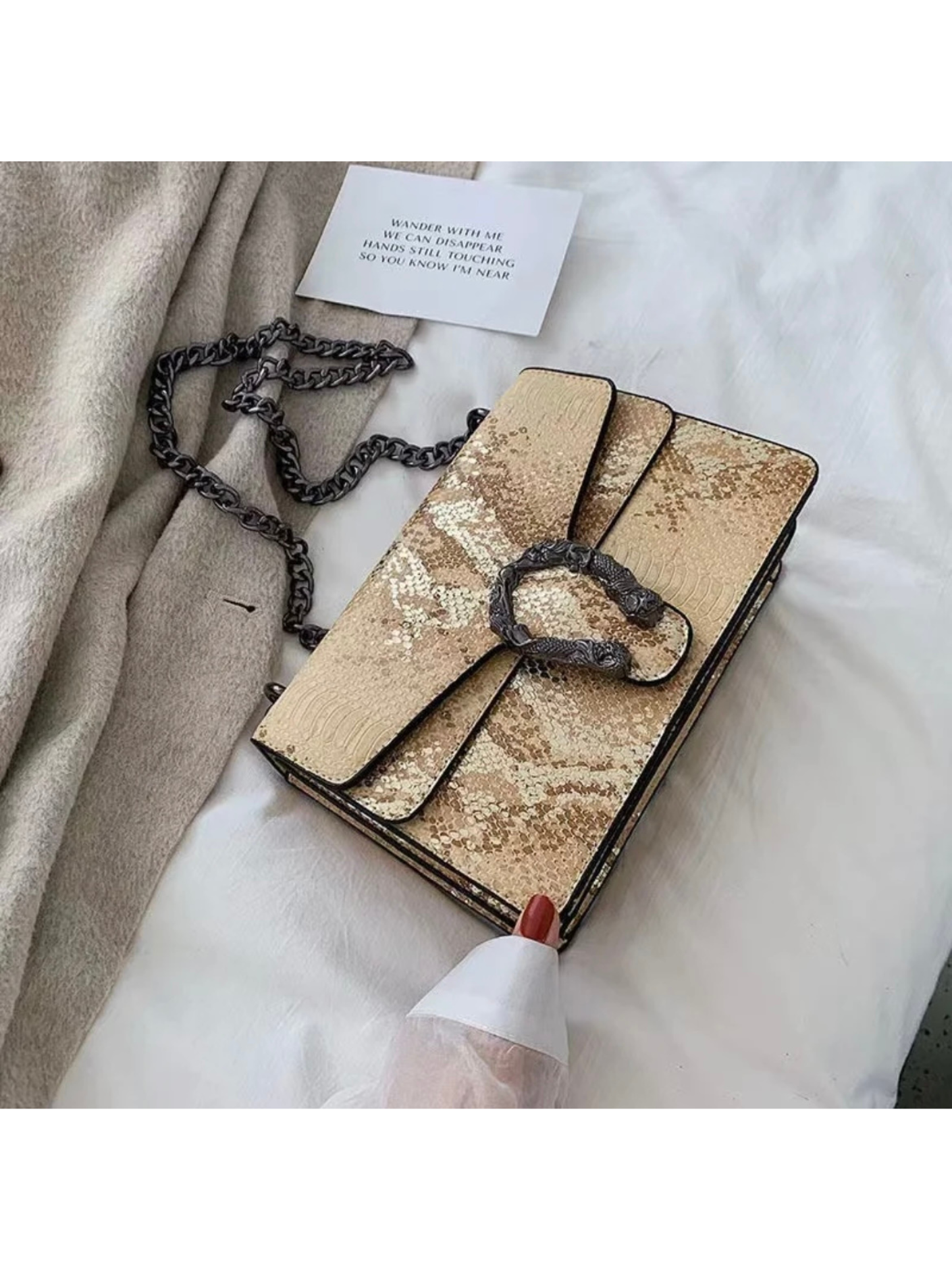Bolso serpiente hebilla