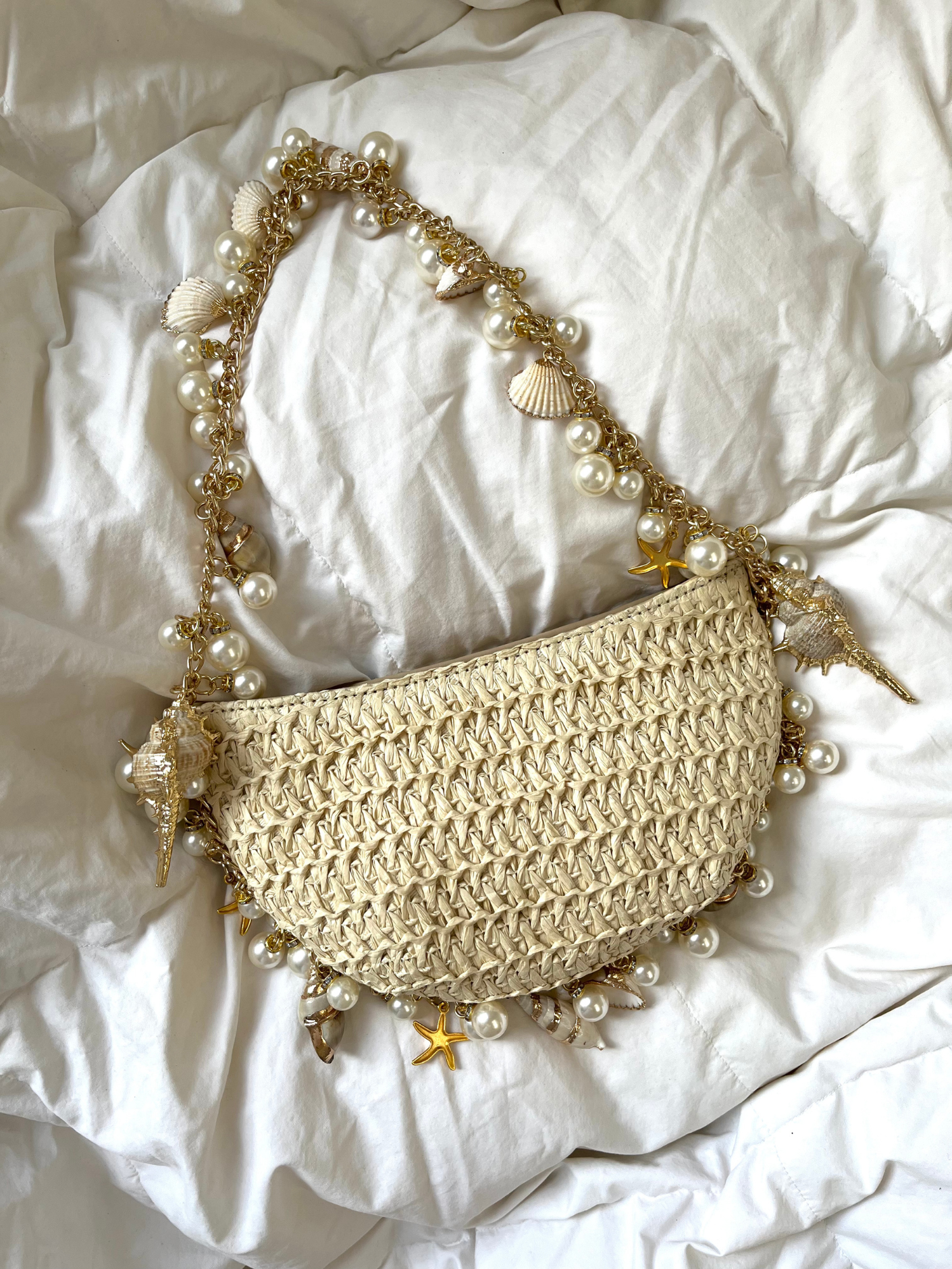 Bolso perlas caracolas