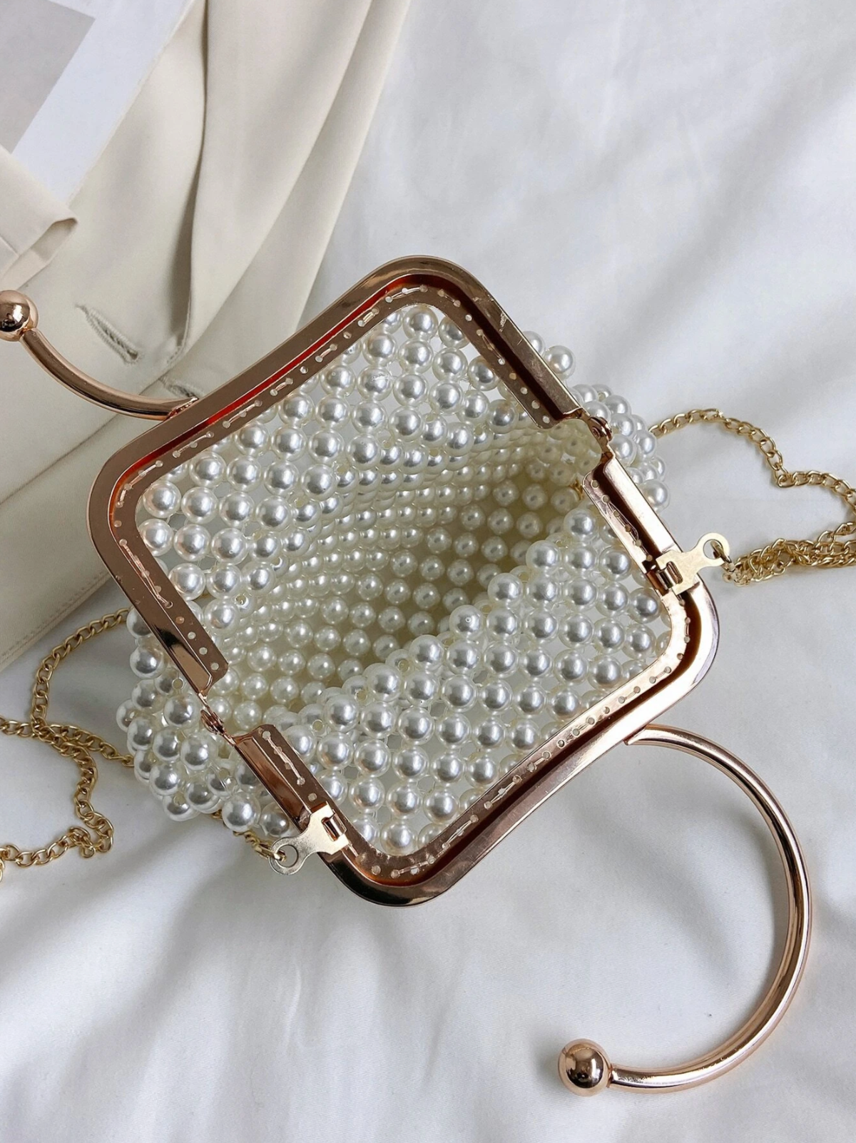 Bolso monedero perlas tejido