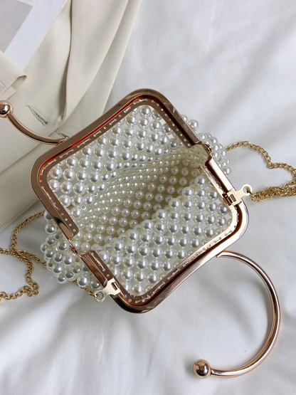 Bolso monedero perlas tejido