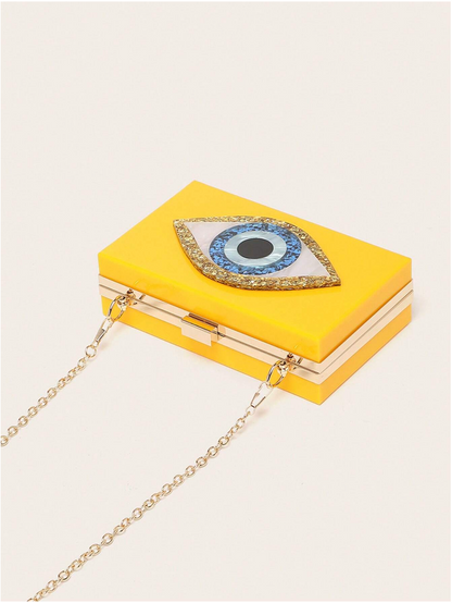 Bolso clutch ojo protector