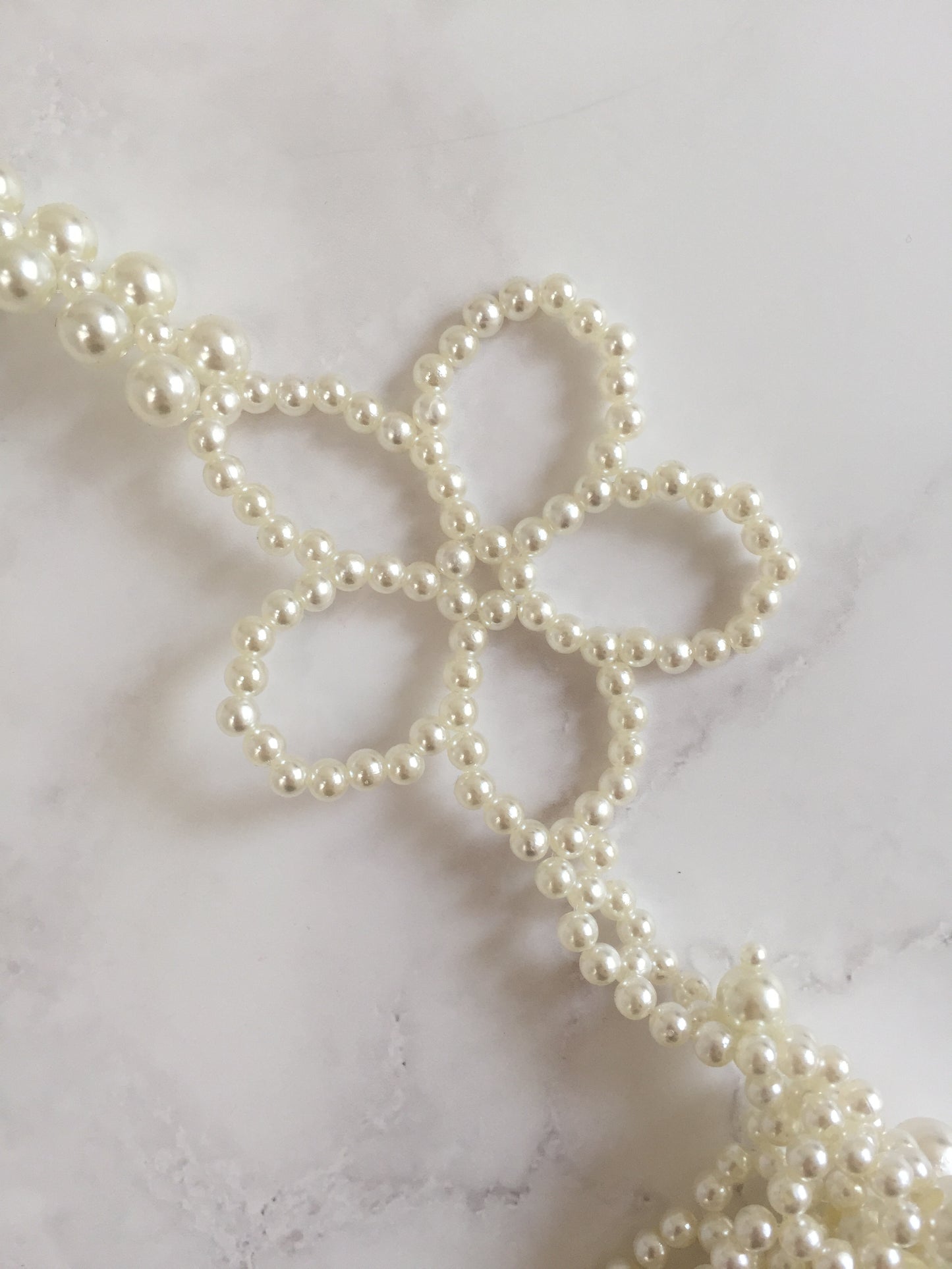 Bolso perlas flores