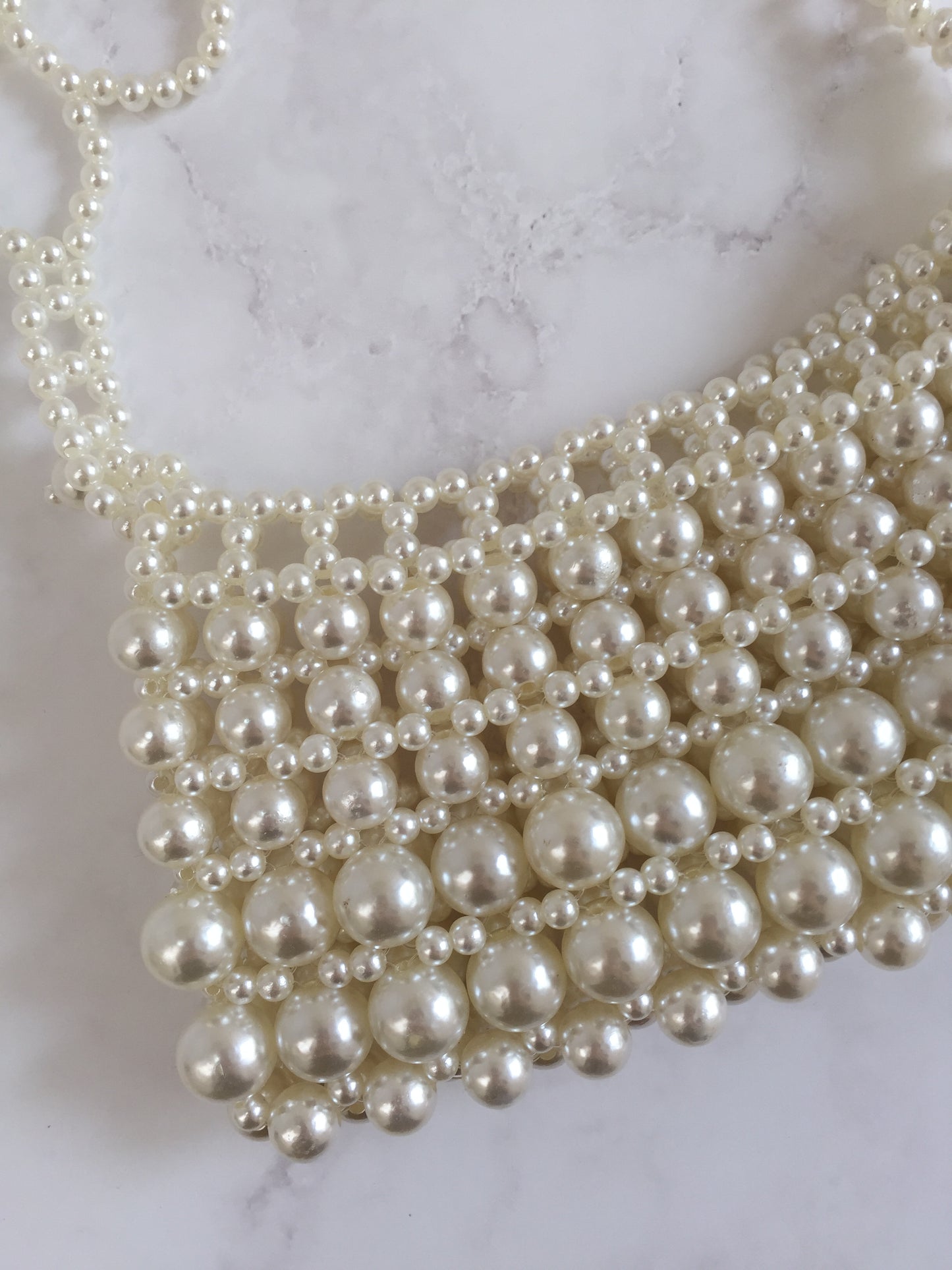 Bolso perlas flores
