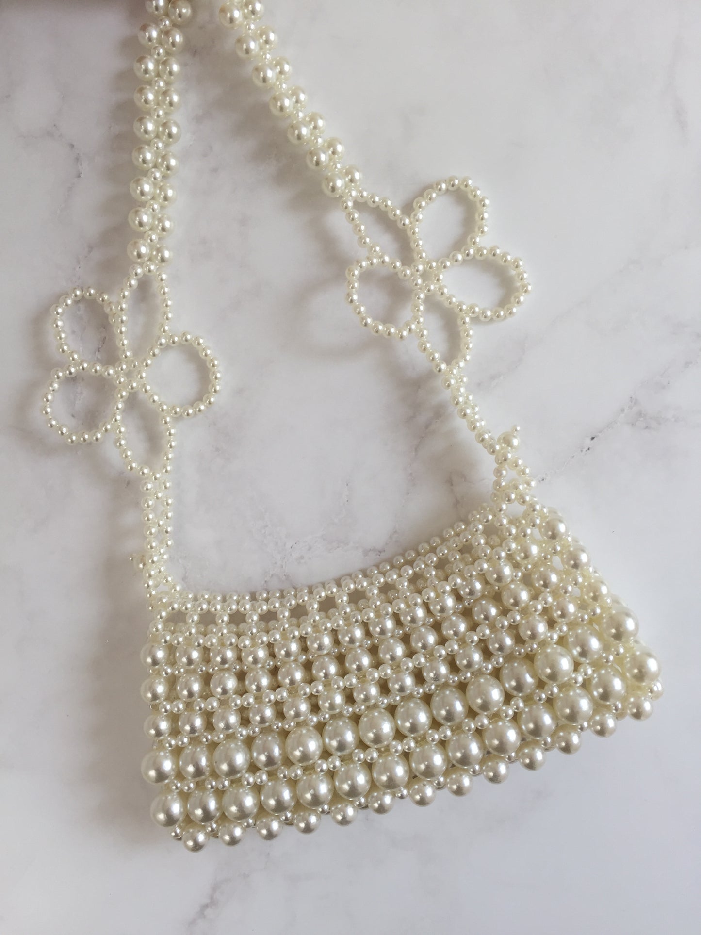Bolso perlas flores
