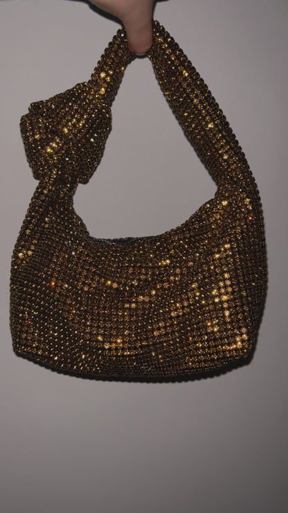 Bolso diamantes incrustados nudo
