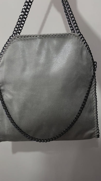 Bolso tote metálico diseño cadena (interior animal print)